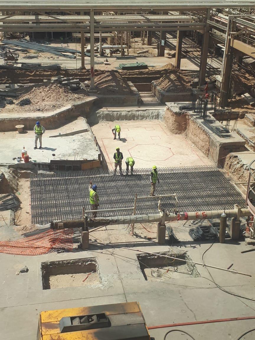 Team discussion at refinery site